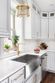 Cape Harbor 1 Light 13" Pendant in Rubbed Brass in a room setting