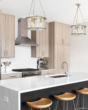 Cape Harbor 3 Light 18" Pendant in Brushed Nickel in a room setting