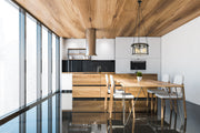 Cape Harbor 3 Light 18" Pendant in Matte Black in a room setting