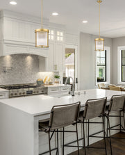 Carnaby 3 Light 10" Pendant in Modern Gold in a room setting