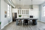 Carnaby 5 Light 18.25" Pendant in Matte Black in a room setting