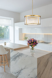 Carnaby 6 Light 24.25" Pendant in Modern Gold in a room setting