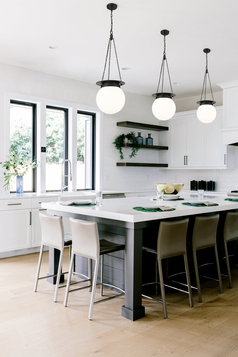 Calhoun 1 Light 13" Pendant in Matte black in a room setting
