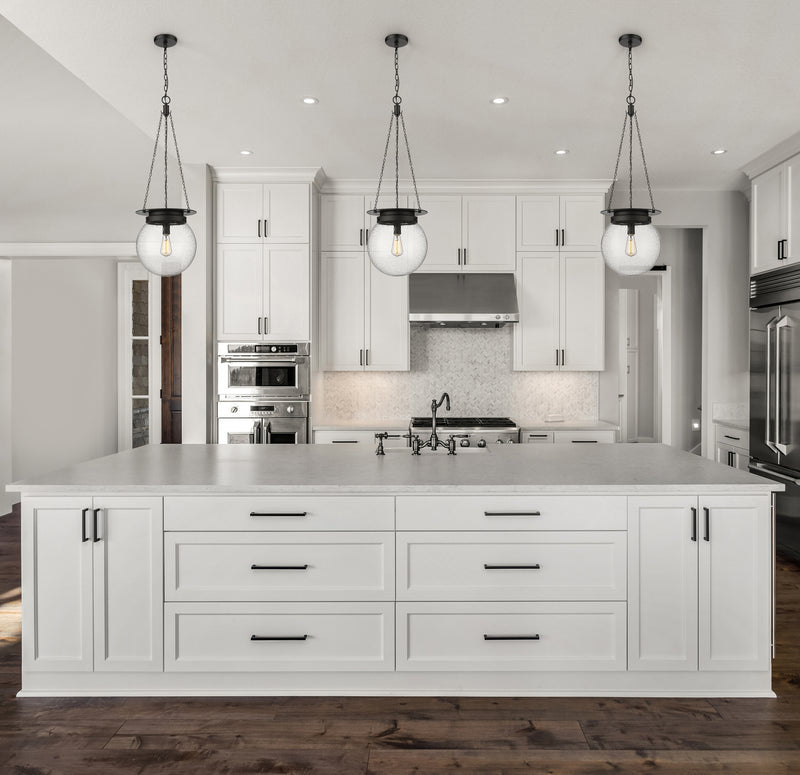 Calhoun 1 Light 13" Pendant in Matte black in a room setting
