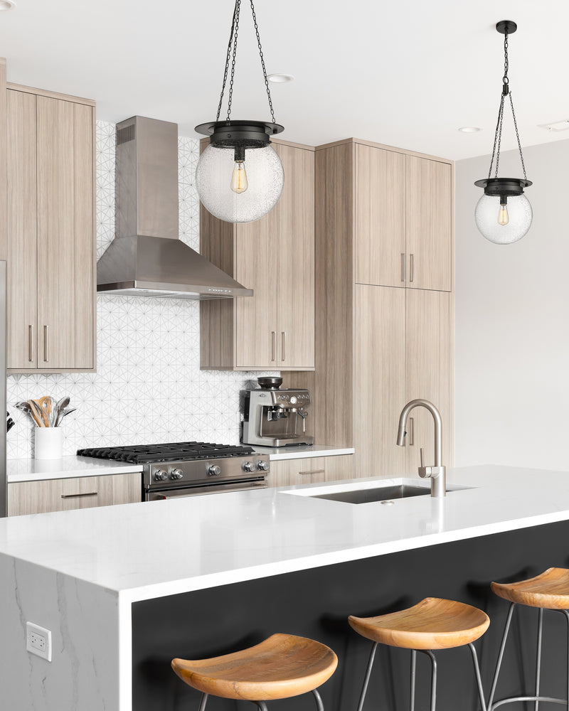 Calhoun 1 Light 13" Pendant in Matte black in a room setting