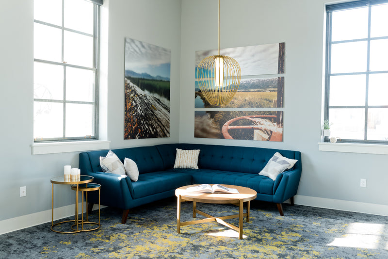 Savanti 1 Light 22" Pendant in Modern Gold in a room setting