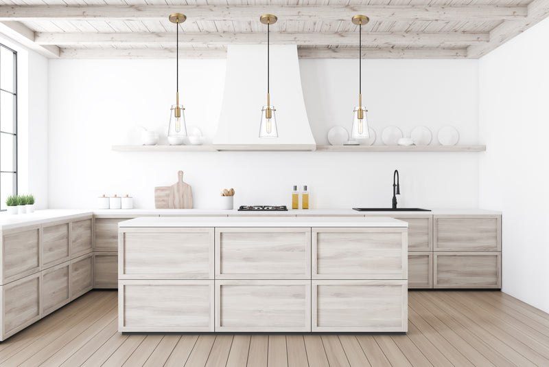 Kira 1 Light 5" Pendant, Cord Mount in Modern Gold in a room setting