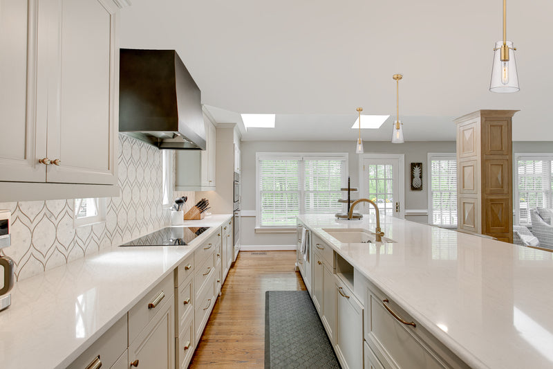 Kira 1 Light 5" Pendant, Rod Mount in Modern Gold in a room setting