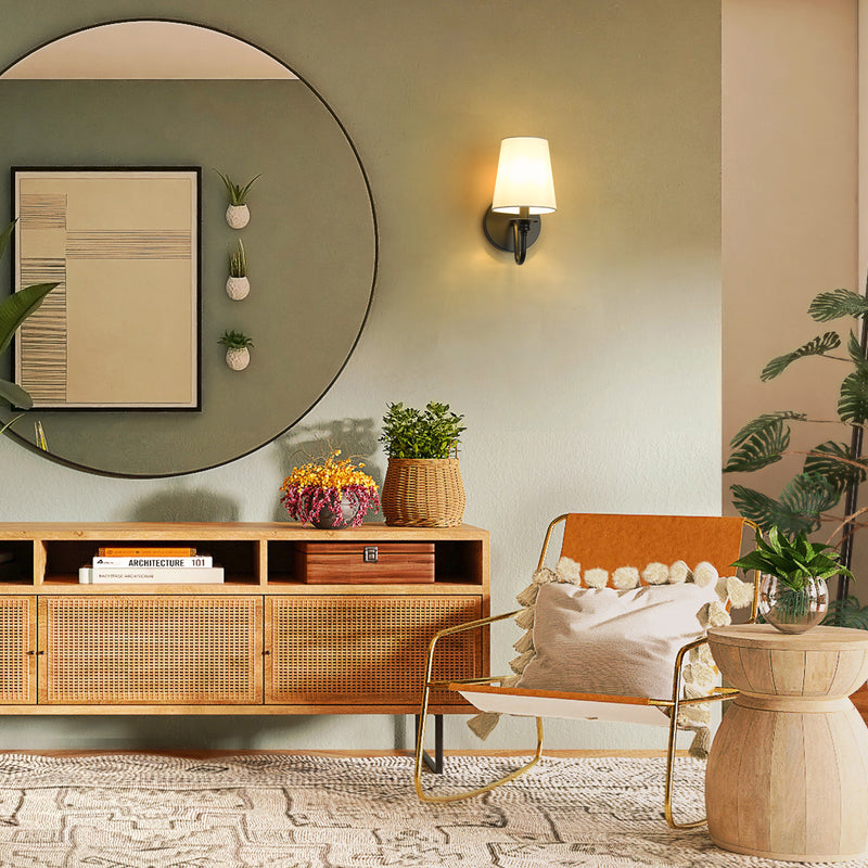 Gianna 1 Light 5.5" Wall Sconce in Matte Black in a room setting