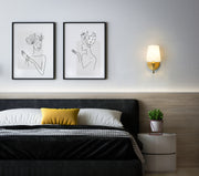 Gianna 1 Light 5.5" Wall Sconce in Modern Gold in a room setting