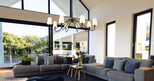Gianna 8 Light 60.25" Chandelier in Matte Black in a room setting