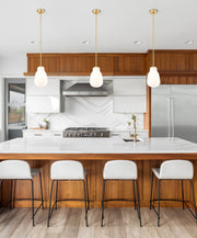 Newbury 1 Light 8" Pendant in Modern Gold in a room setting