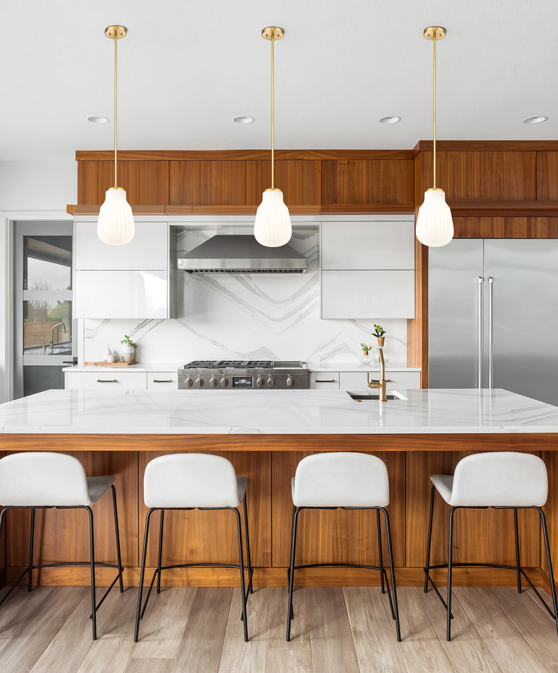 Newbury 1 Light 8" Pendant in Modern Gold in a room setting