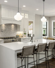 Newbury 1 Light 13" Pendant in Matte Black in a room setting