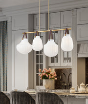 Newbury 4 Light 49.75" Pendant in Modern Gold in a room setting