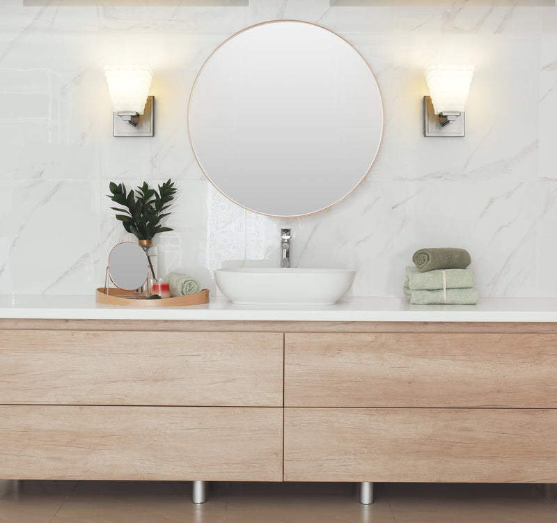Annalise 1 Light 5" Wall Sconce in Brushed Nickel in a room setting