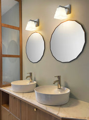Annalise 1 Light 5" Wall Sconce in Brushed Nickel in a room setting