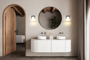 Annalise 1 Light 5" Wall Sconce in Matte Black in a room setting