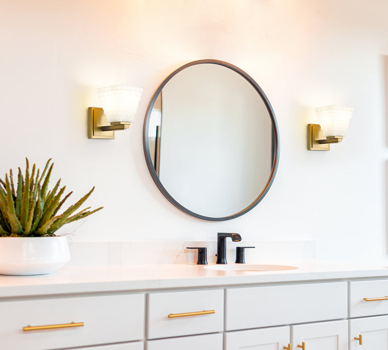 Annalise 1 Light 5" Wall Sconce in Modern Gold in a room setting