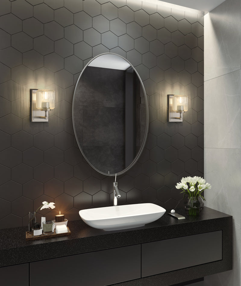 Landon 1 Light 5" Wall Sconce in Brushed Nickel in a room setting