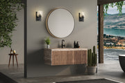 Landon 1 Light 5" Wall Sconce in Matte Black in a room setting