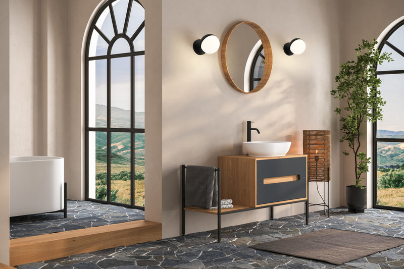 Realm Sphere 1 Light 6.25" Wall Sconce in Matte Black in a room setting