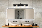 Realm Sphere 4 Light 32.25" Vanity in Matte Black in a room setting