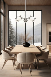 Realm Sphere 5 Light 32" Chandelier in Brushed Nickel in a room setting