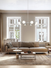 Realm Sphere 8 Light 44" Chandelier in Brushed Nickel in a room setting