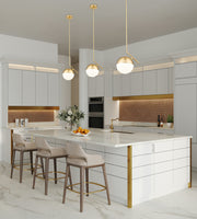 Realm Sphere 1 Light 10.75" Pendant in Modern Gold in a room setting