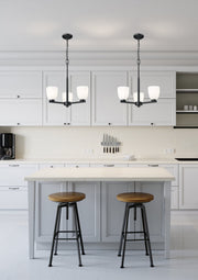 Naya 3 Light 19.25" Chandelier in Matte Black in a room setting