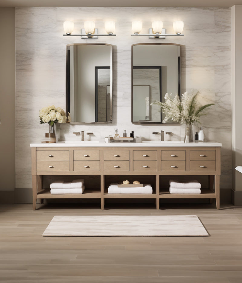 Naya 3 Light 24" Vanity in Brushed Nickel in a room setting