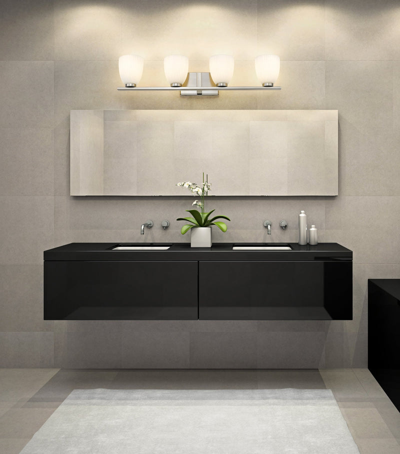 Naya 4 Light 32" Vanity in Brushed Nickel in a room setting