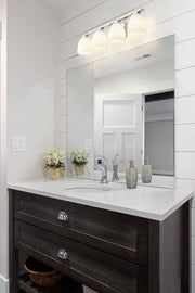 Naya 4 Light 32" Vanity in Chrome in a room setting