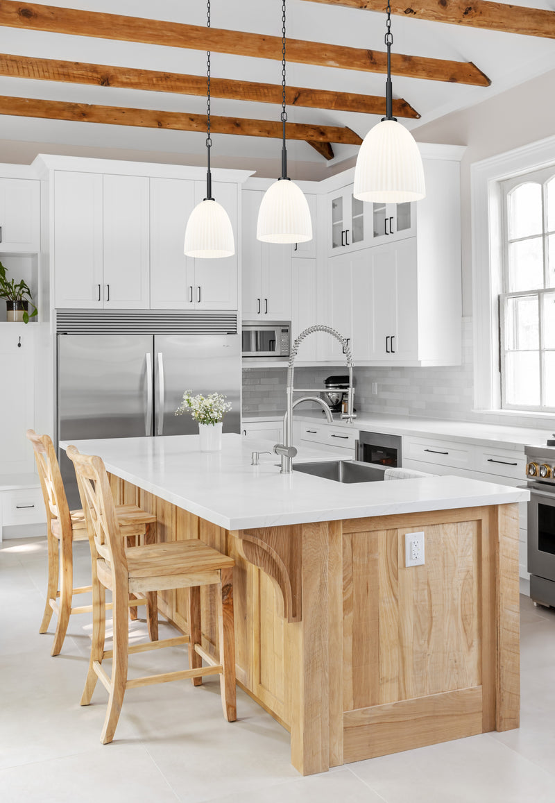 Naya 1 Light 11.75" Pendant in Matte Black in a room setting