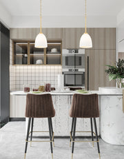 Naya 1 Light 8" Pendant in Modern Gold in a room setting