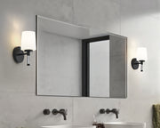 Henri 1 Light 6.5" Vanity in Matte Black in a room setting