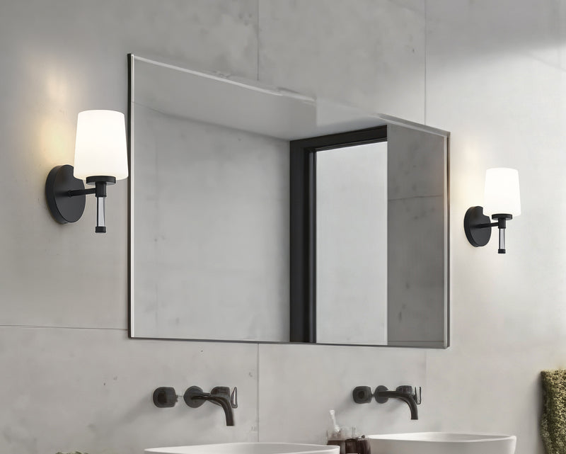 Henri 1 Light 6.5" Vanity in Matte Black in a room setting