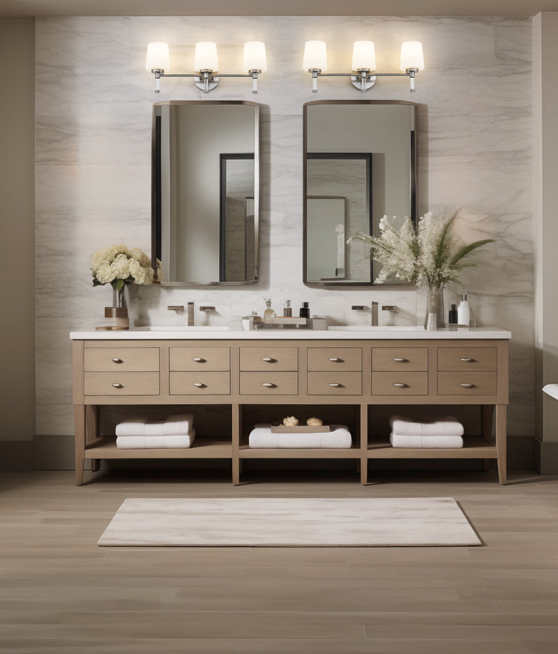 Henri 3 Light 24" Vanity in Brushed Nickel in a room setting
