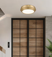 Quasars 1 Light 12" Flush Mount in Modern Gold in a room setting