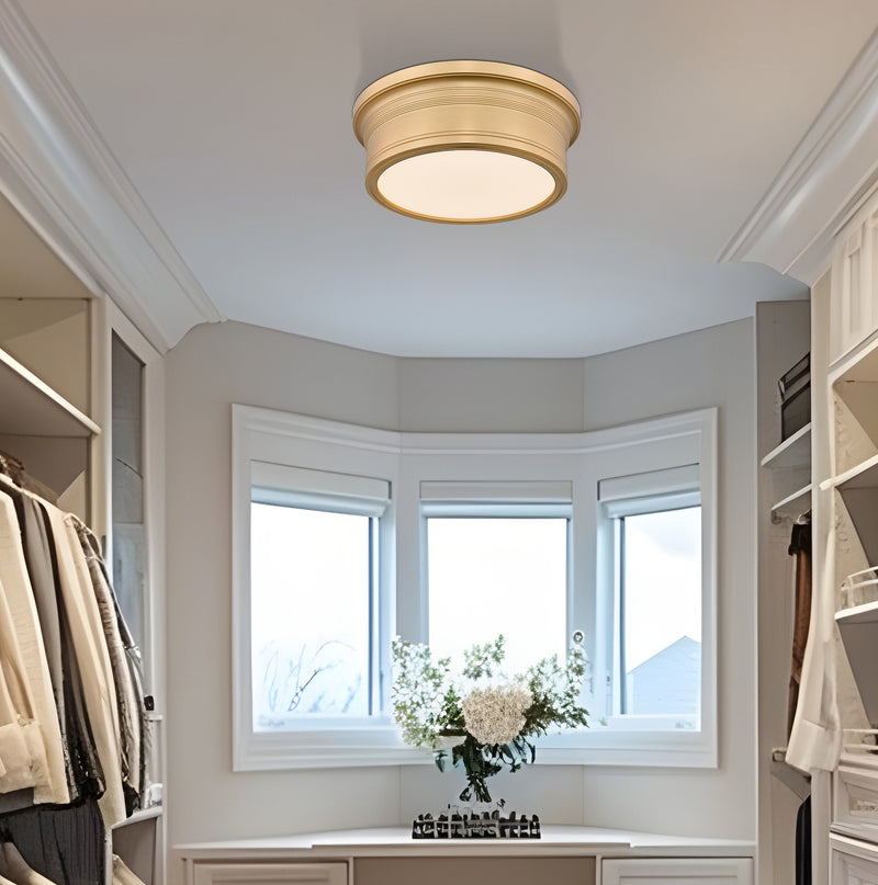 Bentley 1 Light 12" Flush Mount in Modern Gold in a room setting