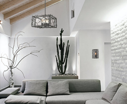 Stanwood 1 Light 8.5" Wall Sconce in Bronze in a room setting