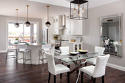 Troubadour 5 Light 16" Pendant in Bronze in a room setting