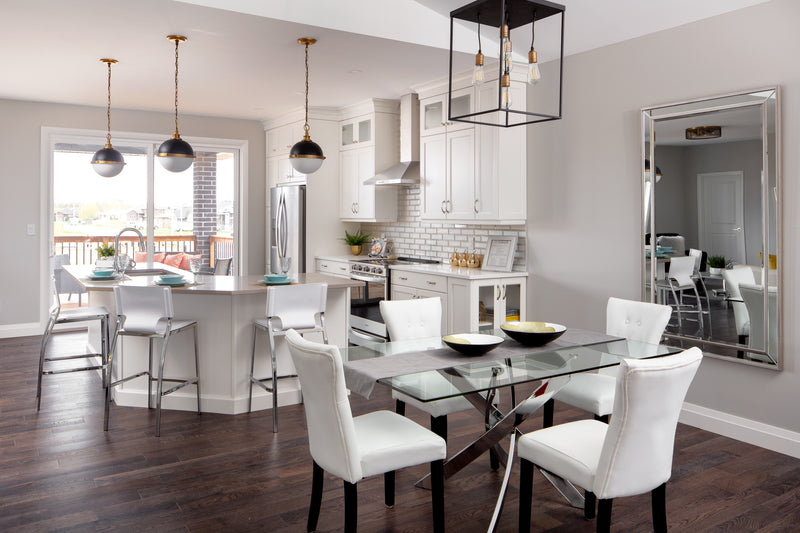 Troubadour 5 Light 16" Pendant in Bronze in a room setting