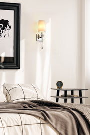 Sophia 1 Light 5.5" Wall Sconce in Polished Nickel in a room setting