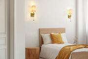 Sophia 1 Light 5.5" Wall Sconce in Rubbed Brass in a room setting