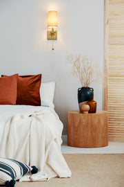 Sophia 1 Light 5.5" Wall Sconce in Rubbed Brass in a room setting