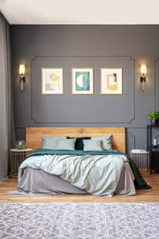 Ava 1 Light 5.5" Wall Sconce in Matte Black in a room setting