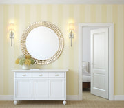 Ava 1 Light 5.5" Wall Sconce in Polished Nickel in a room setting