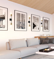 Calumet 2 Light 4.5" Wall Sconce in Matte Black + Olde Brass in a room setting